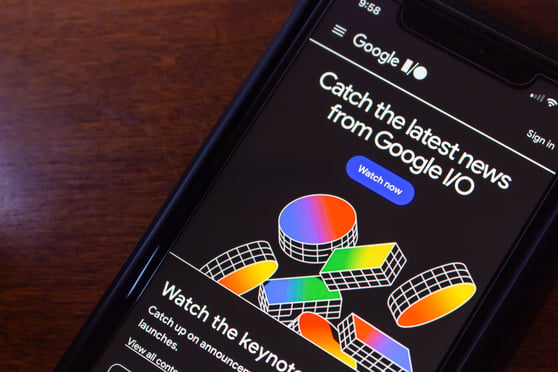 Google I/O website seen in iPhone screen. Google I/O is Google's annual developer conference, featuring new technology announcements and developer workshops.