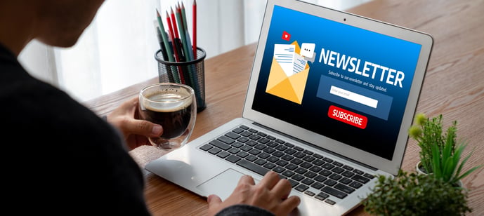 Email newsletter signup page on a laptop supporting content distribution strategy.