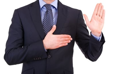 A businessperson pledging to improve AI-powered lead generation strategies.