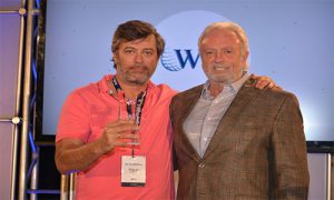 Photo of WSI consultant receiving their award from WSI.