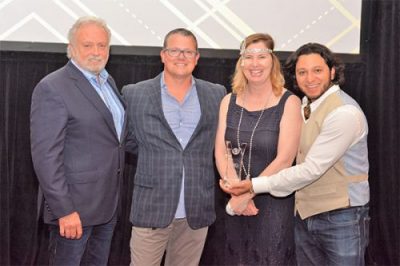 Photograph of SharpSpring team receiving the award from WSI.