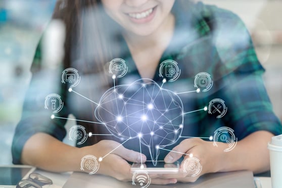 Person using smartphone with AI brain network icons illustrating AI business opportunities in technology.