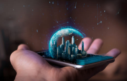 A man holds a futuristic phone in his hand